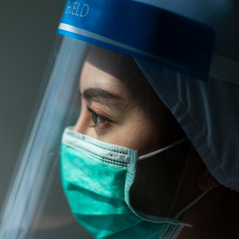 Photo of health professional wearing face mask and face shield