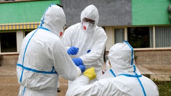 Healthcare workers in PPE during the COVID-19 pandemic