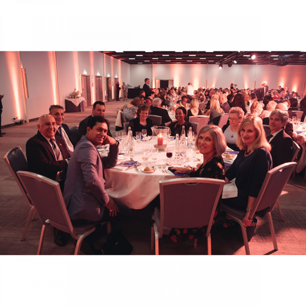 People sitting around tables during the Awards Dinner