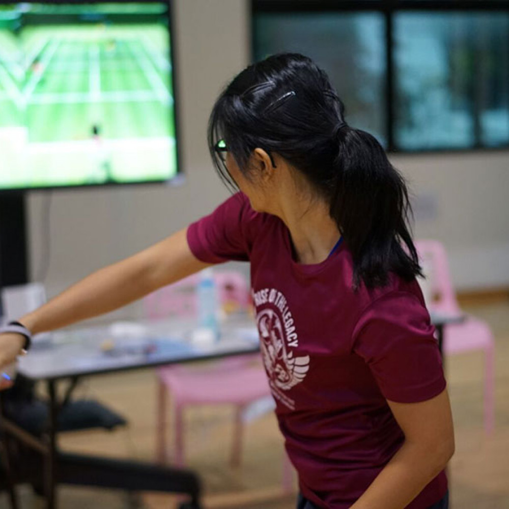 Photograph showing a celebration held in Singapore to mark World PT Day 2018