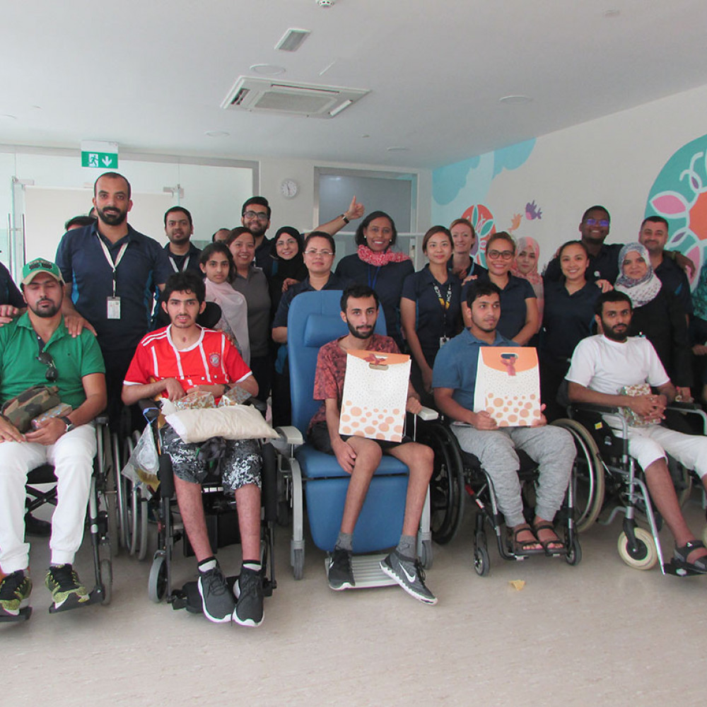 Photograph showing a celebration held in the United Arab Emirates to mark World PT Day 2018