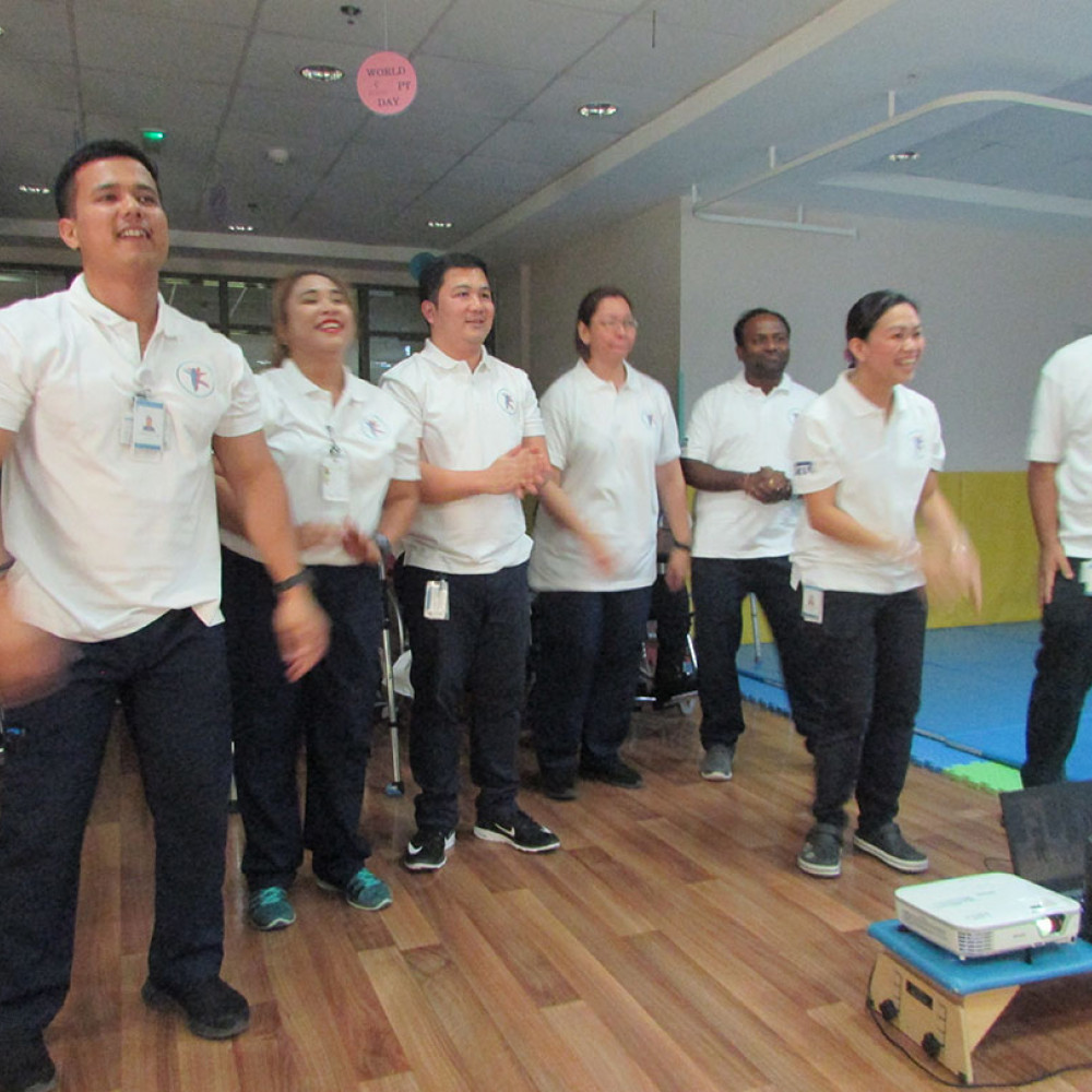 Photograph showing a celebration held in the United Arab Emirates to mark World PT Day 2018
