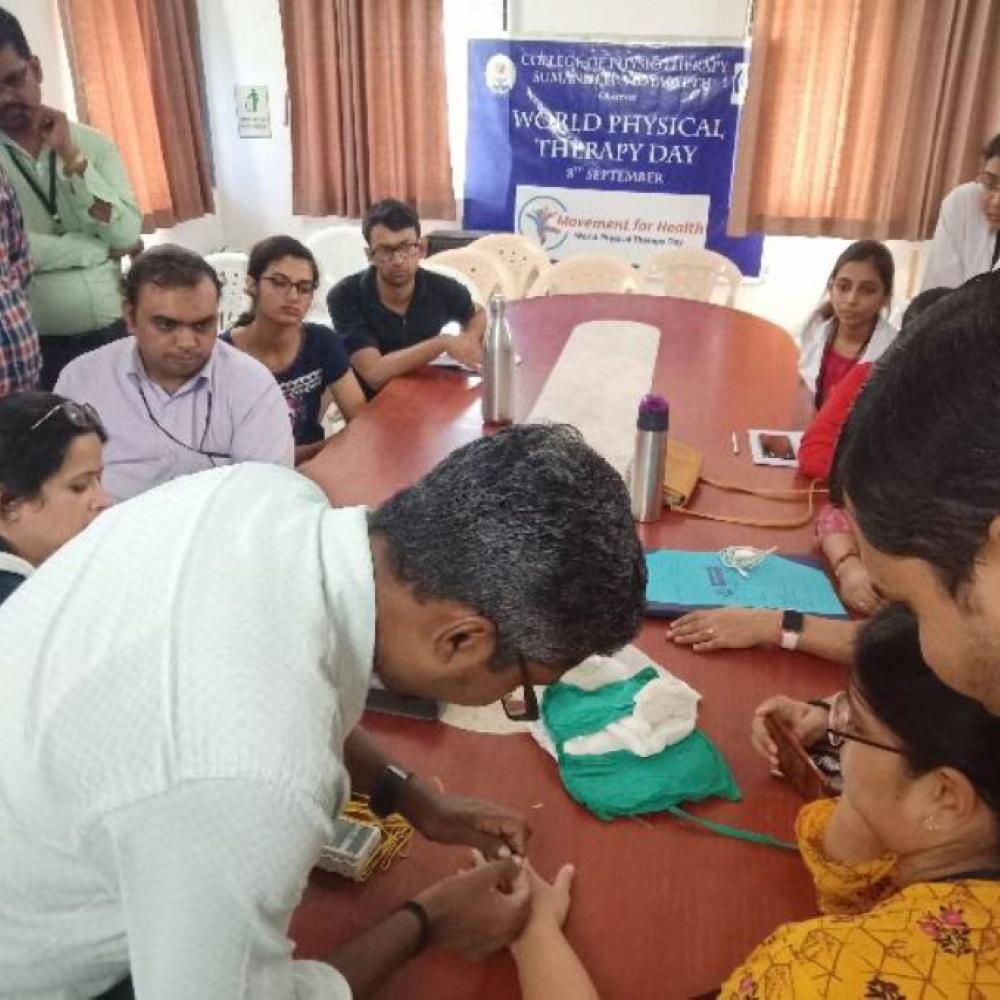 Photograph showing a celebration held in India to mark World PT Day 2019