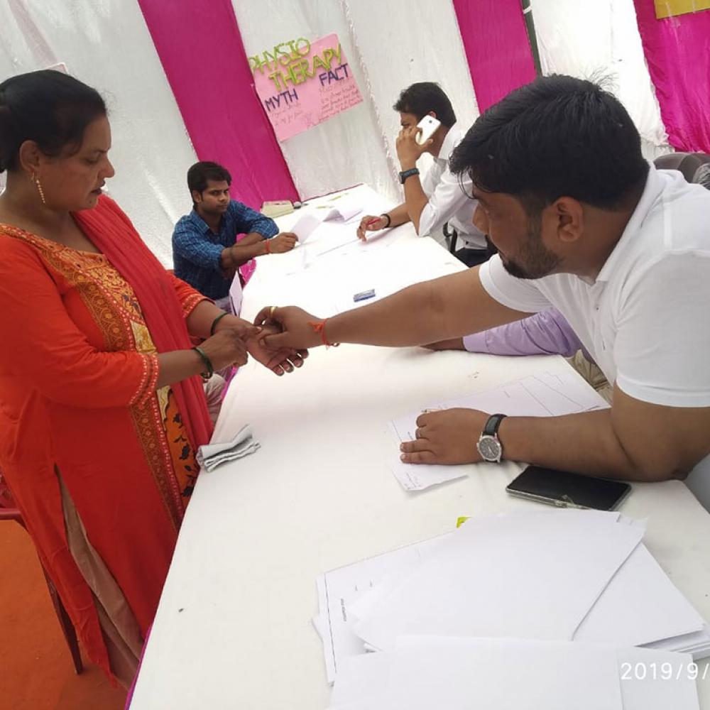 Photograph showing a celebration held in India to mark World PT Day 2019