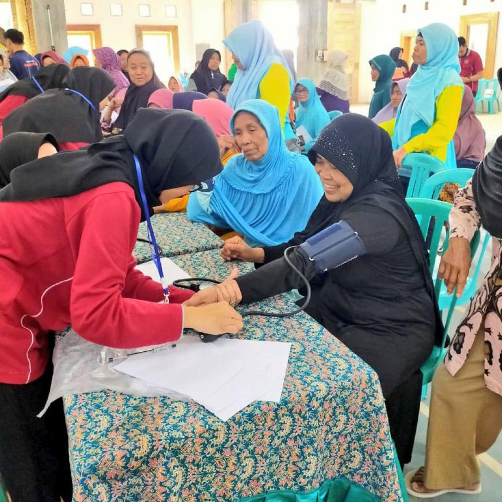Photograph showing a celebration held in Indonesia to mark World PT Day 2019