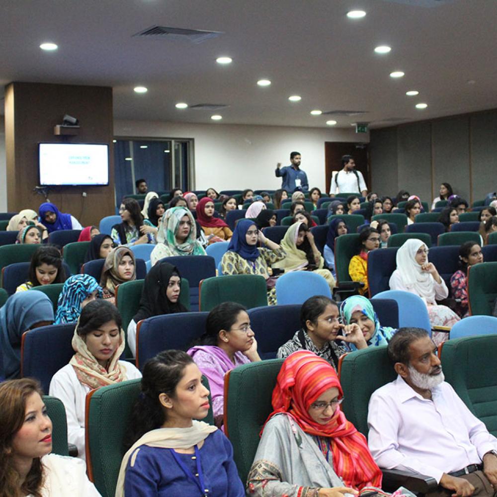 Photograph showing a celebration held in Pakistan to mark World PT Day 2019