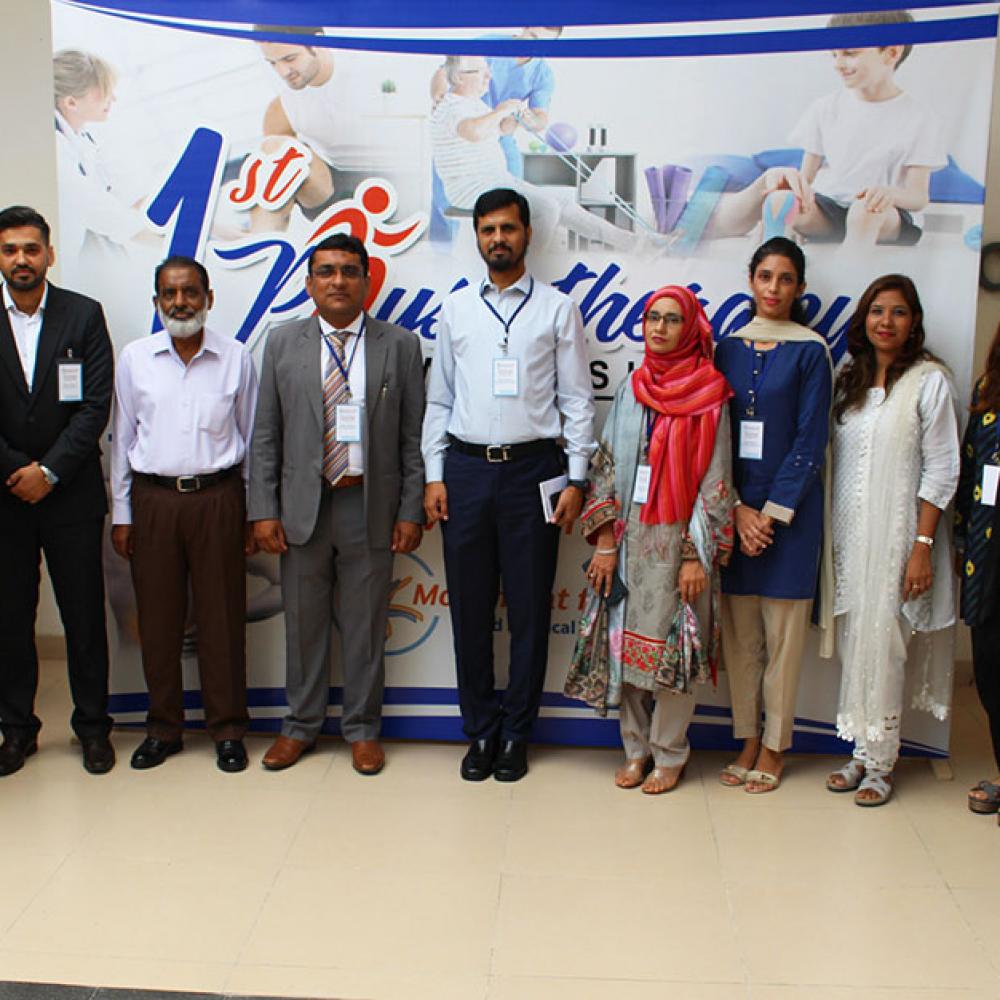 Photograph showing a celebration held in Pakistan to mark World PT Day 2019