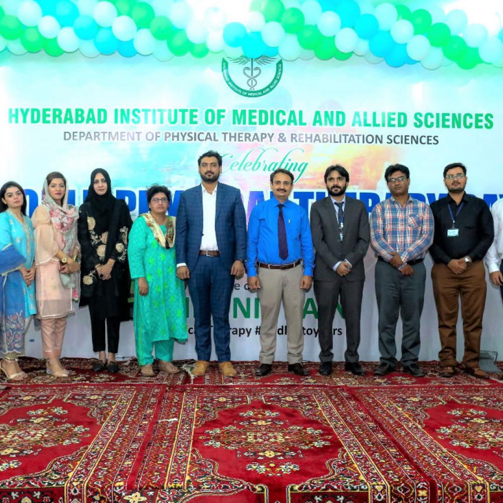 Photograph showing a celebration held in Pakistan to mark World PT Day 2019