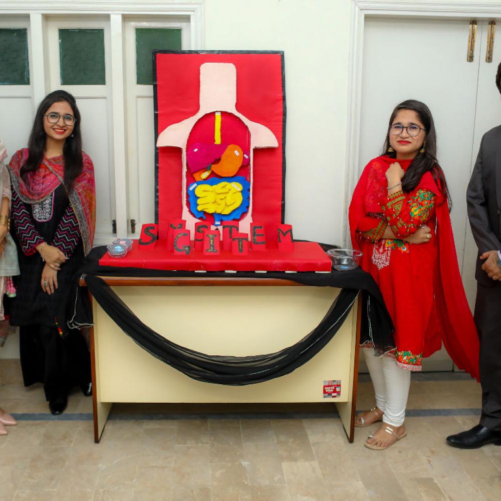 Photograph showing a celebration held in Pakistan to mark World PT Day 2019