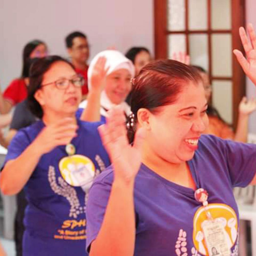 Photographie montrant une célébration organisée aux Philippines pour marquer la Journée mondiale du PT 2019