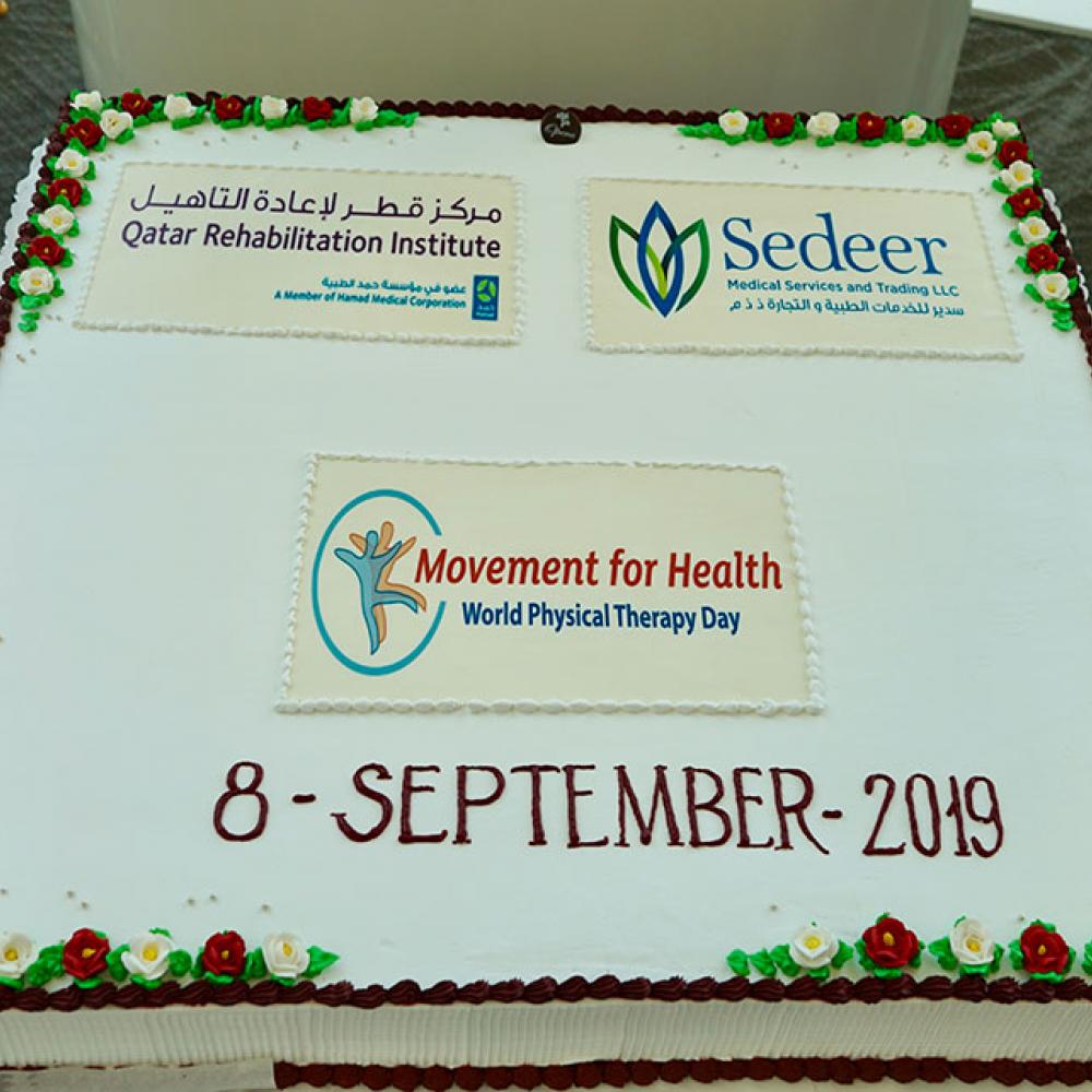 Photograph showing a celebration held in Qatar to mark World PT Day 2019