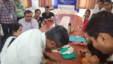 Photograph showing a celebration held in India to mark World PT Day 2019